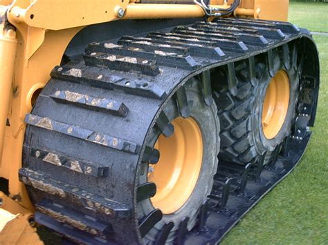 tire tracks for skid steer|skid steer track over wheels.